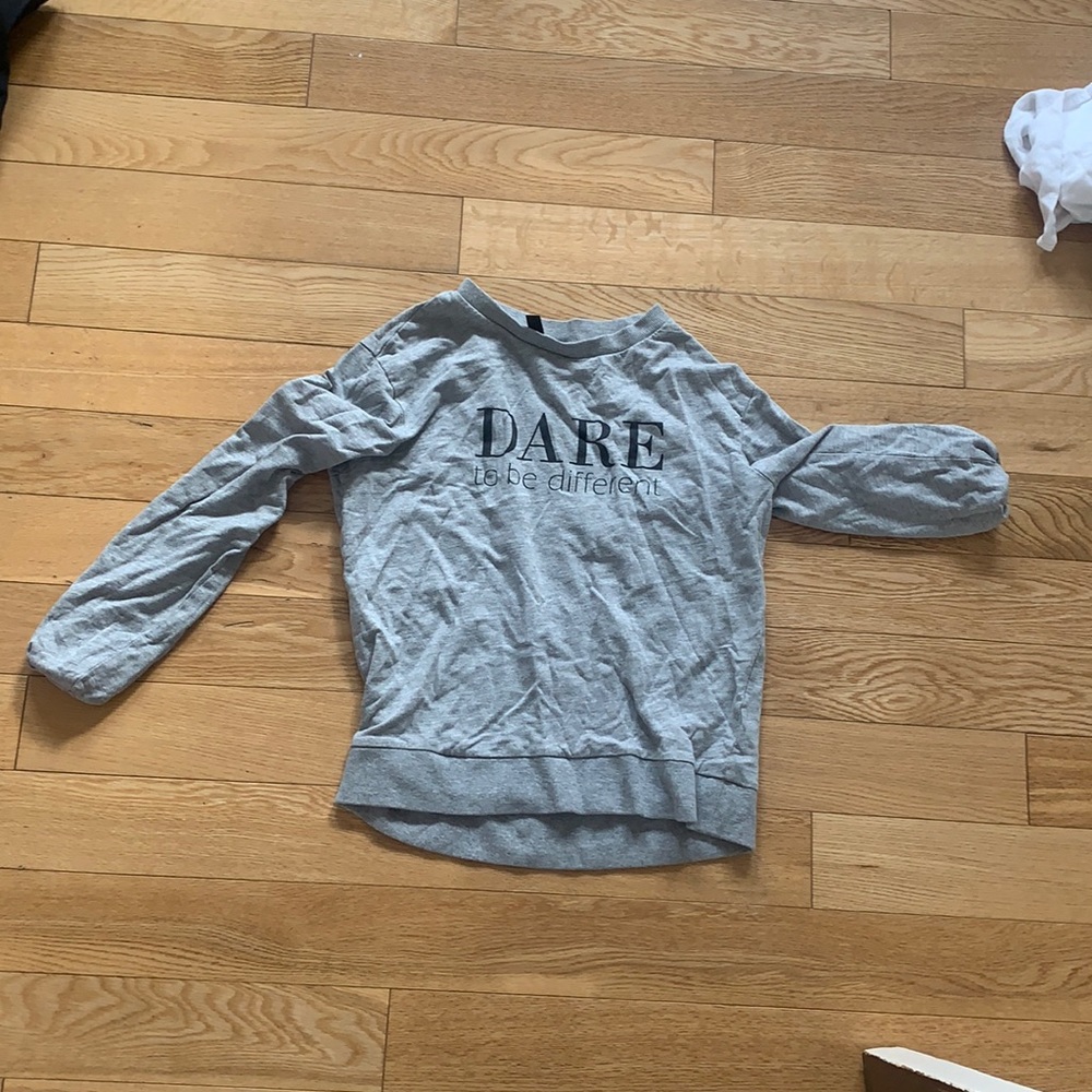 H&M. Shirt with design at front